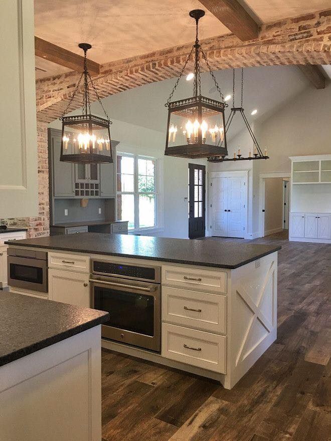 Farmhouse kitchen with brick accents