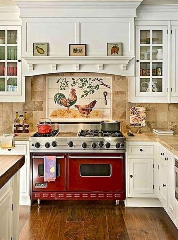 Farmhouse kitchen with bold red stove