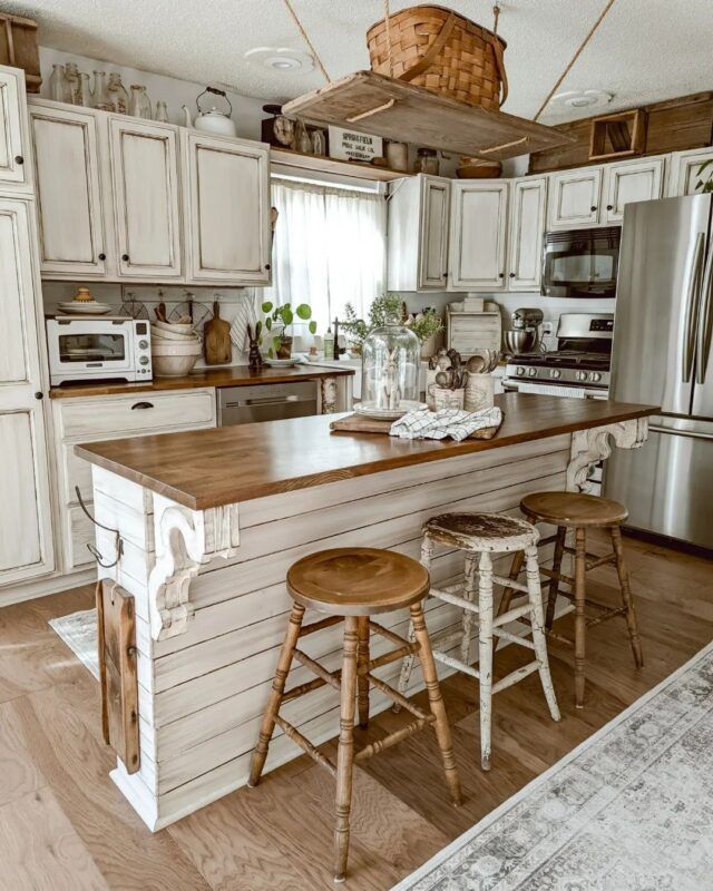 Farmhouse kitchen with mismatched stools