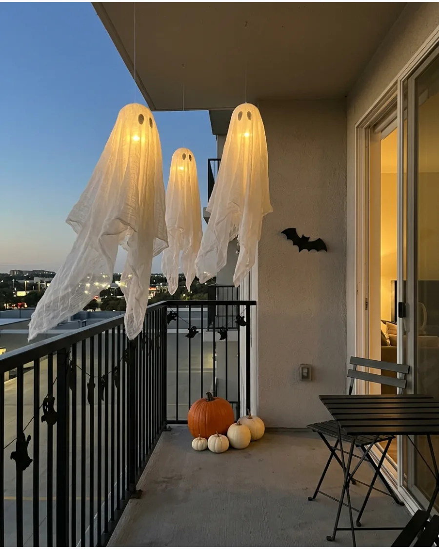 24. Floating Cheesecloth Balcony Ghosts