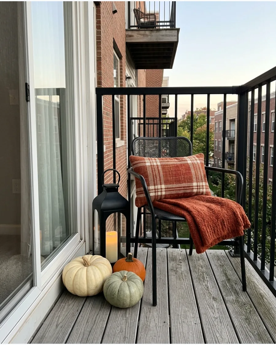 1. Cozy Pumpkin Balcony Retreat