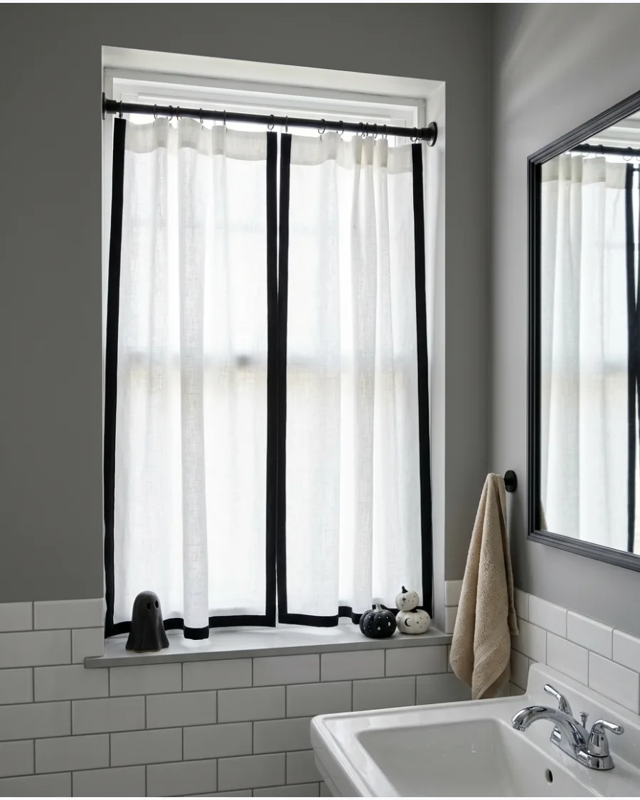 12. Black-Trimmed White Curtains