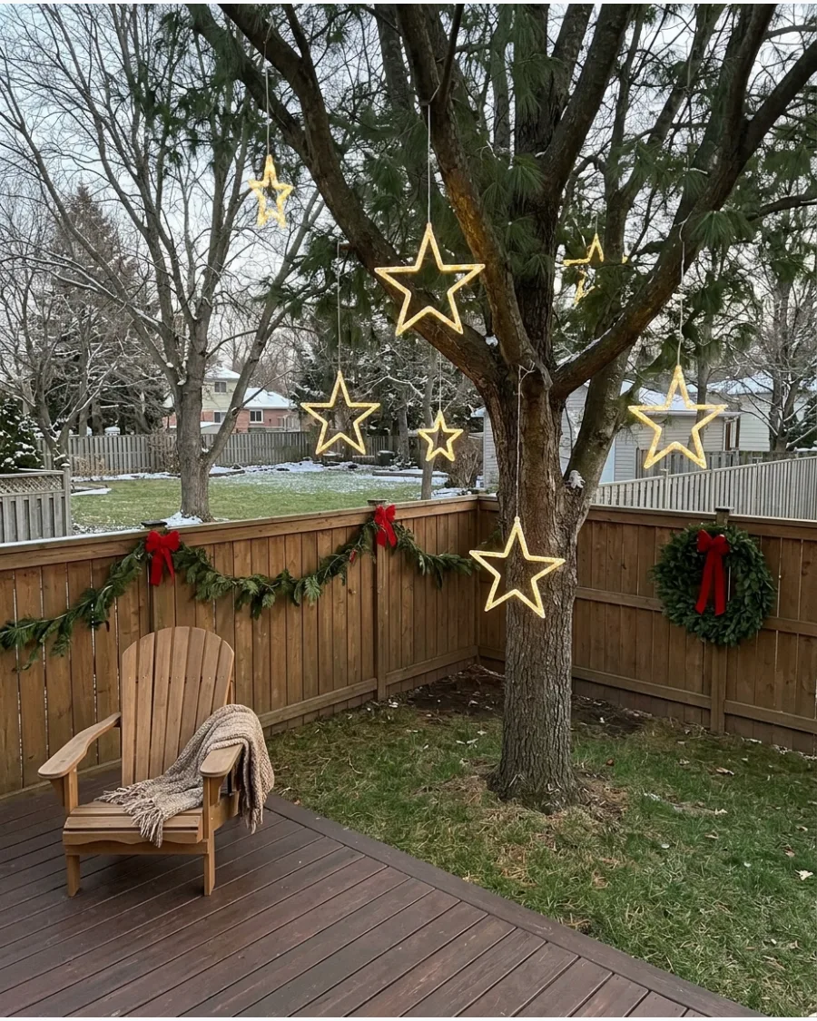 6. Glowing Star Lights Hanging From Trees