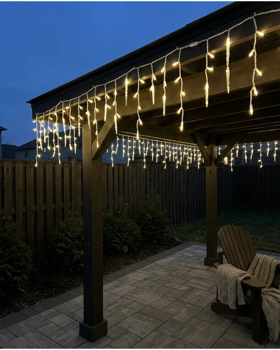 9. Icicle Lights Along a Pergola Roof