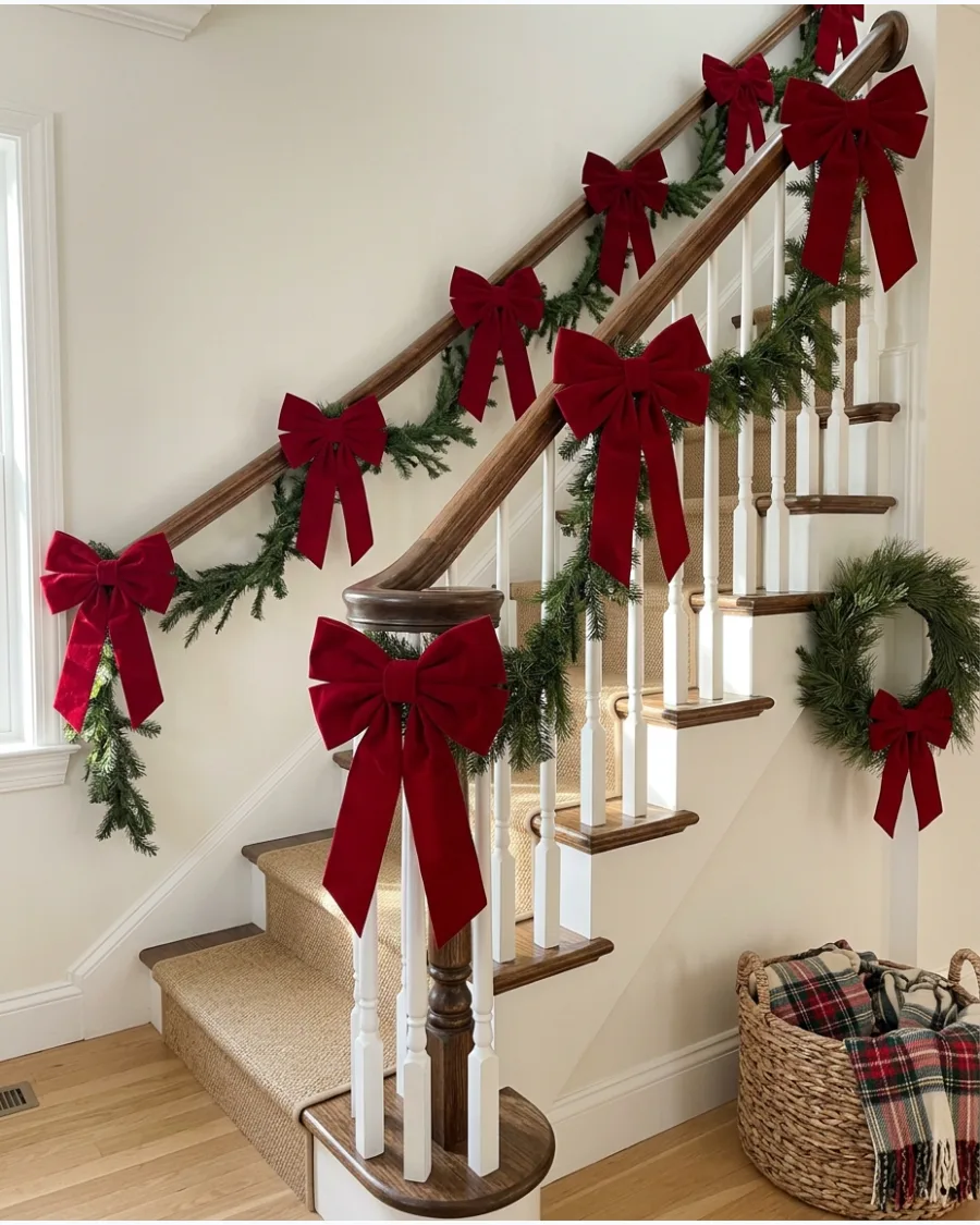 11. Oversized Velvet Bow Christmas Bannister