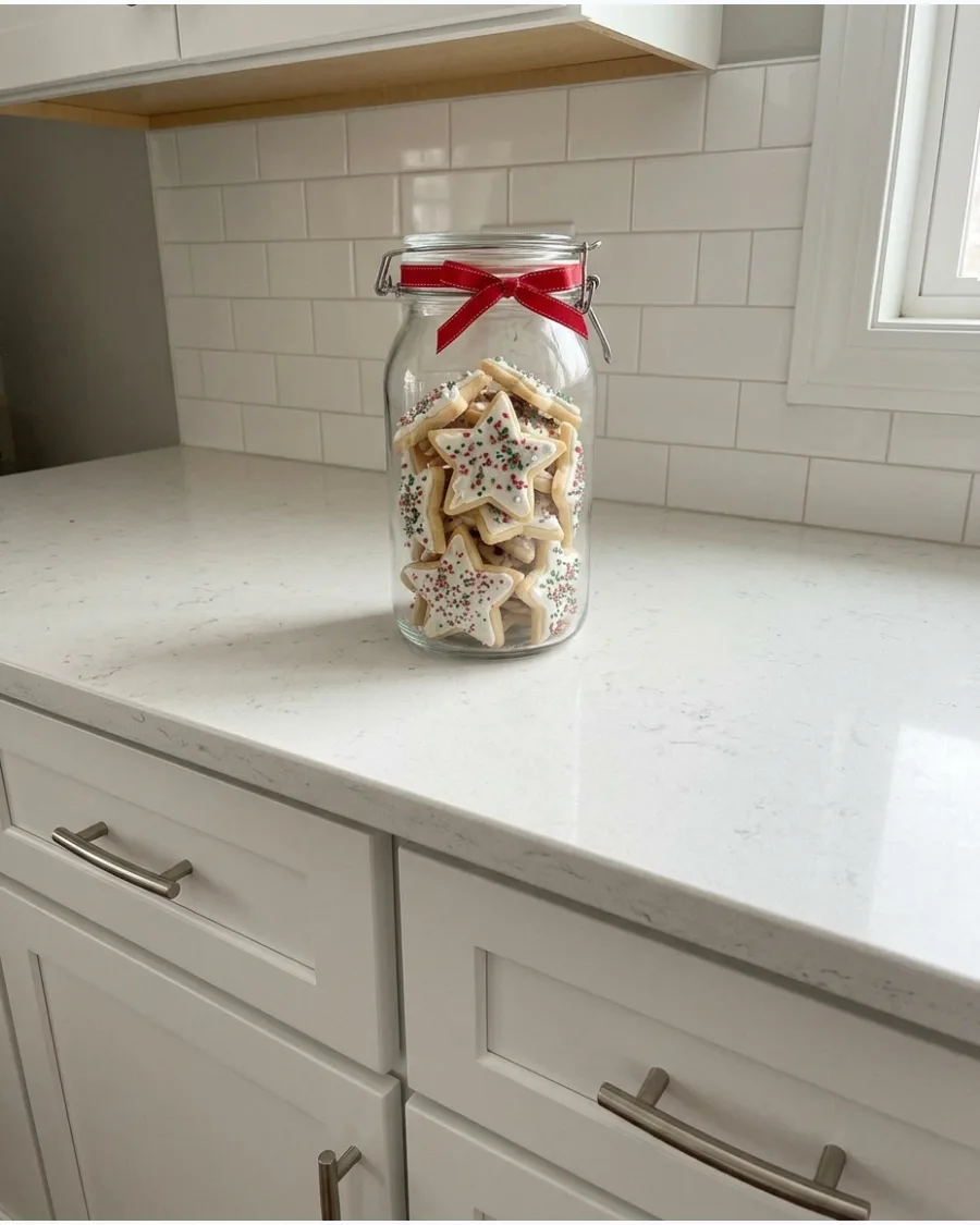 34. Glass Jar Filled With Christmas Cookies