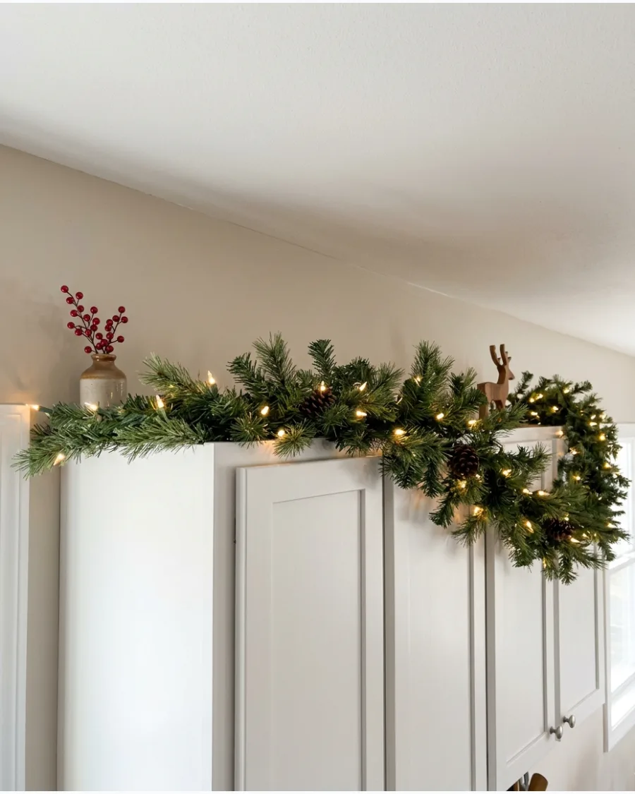 26. Pre-Lit Garland Cabinet Display