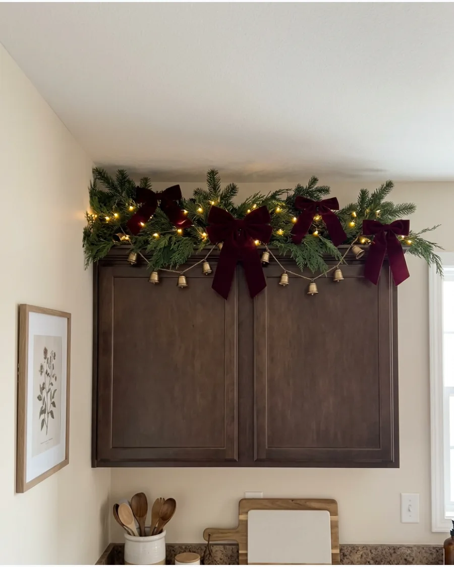 58. Burgundy and Brass Christmas Cabinet Decor