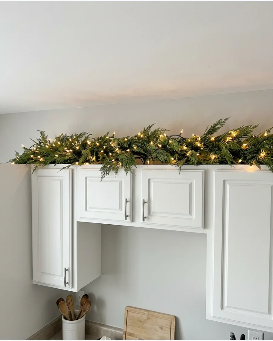60. Illuminated Winter Cabinet Greenery