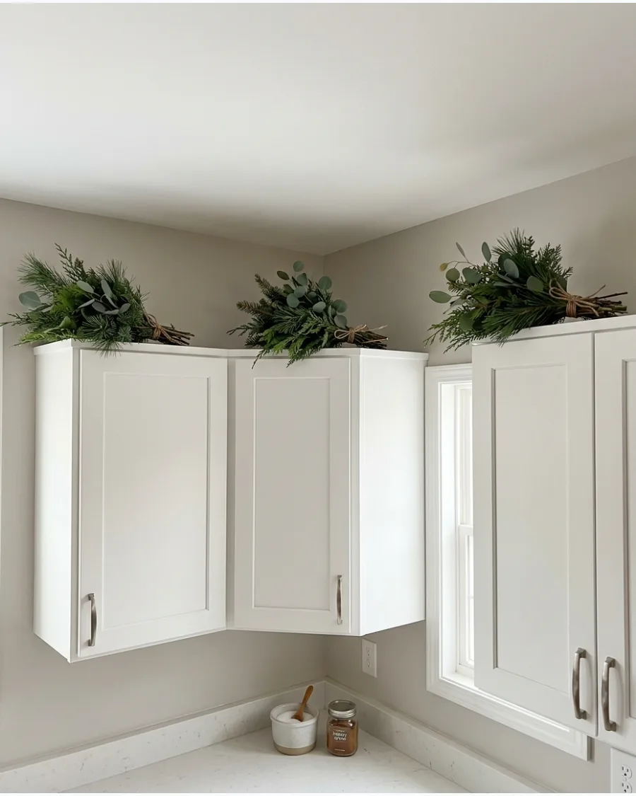 8. Greenery Bundles Between Cabinet Sections
