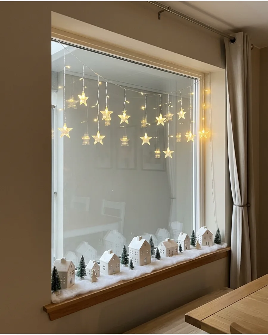 24. Star Lights With a Christmas Village Below