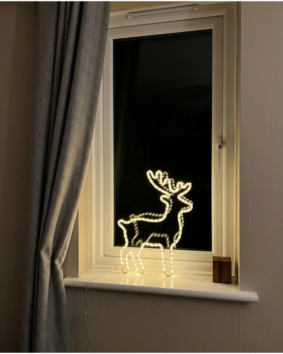 28. Light-Up Reindeer Window Silhouette