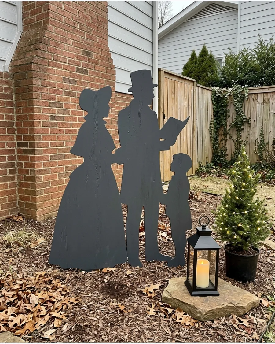73. DIY Christmas Caroler Yard Silhouettes