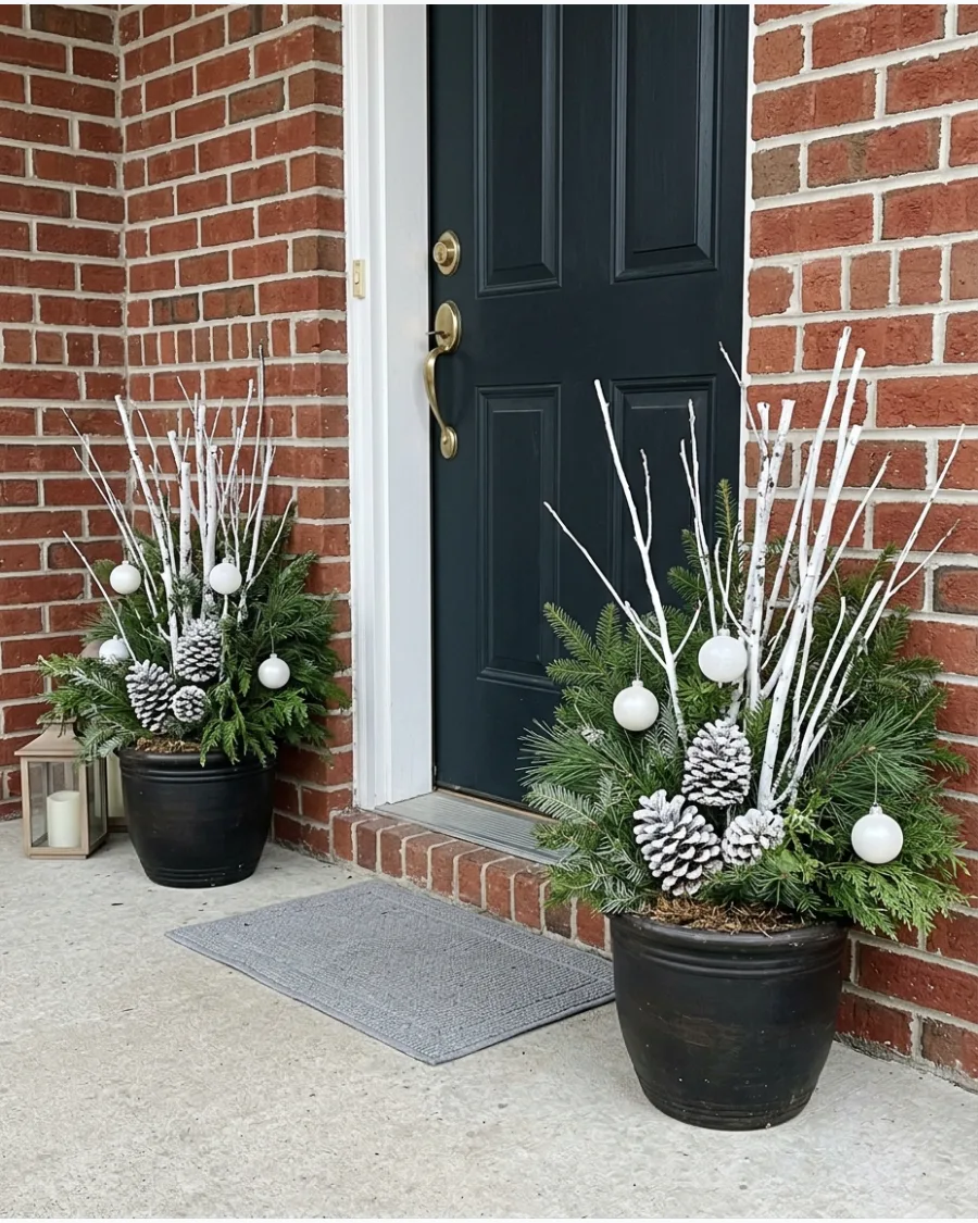 16. DIY Winter White Christmas Porch Planters