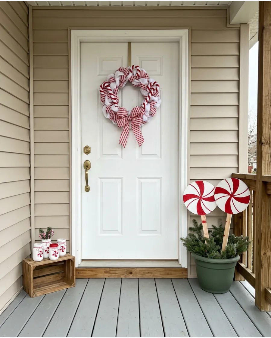48. DIY Peppermint Christmas Porch Decorations