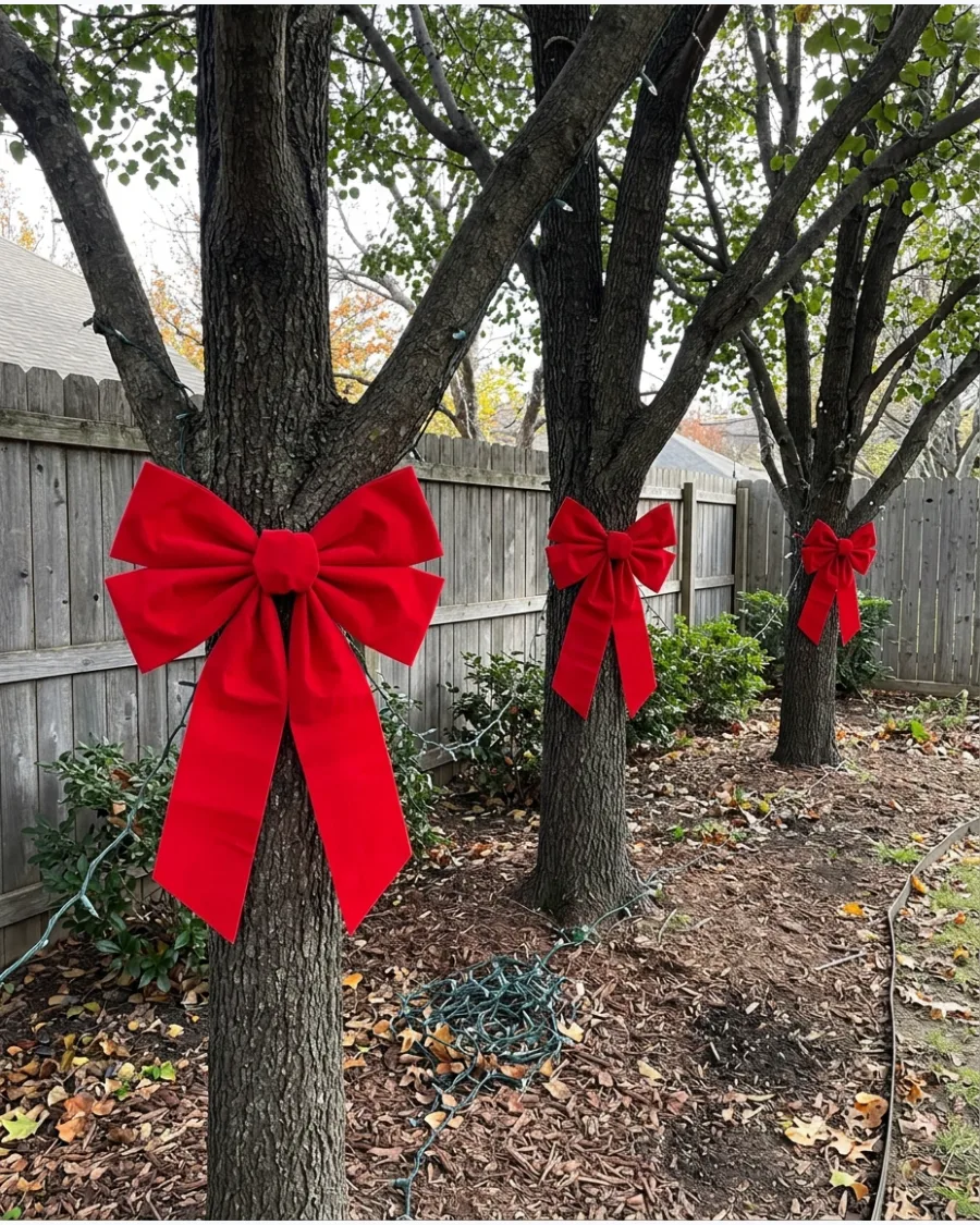 3. Giant Red Bows on Garden Trees