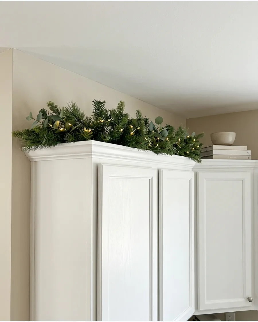 12. Battery-Powered Garland Above Cabinets