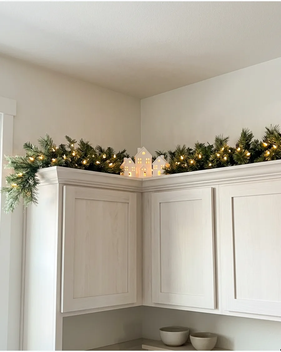 14. Lighted Garland With Glowing Ceramic Houses