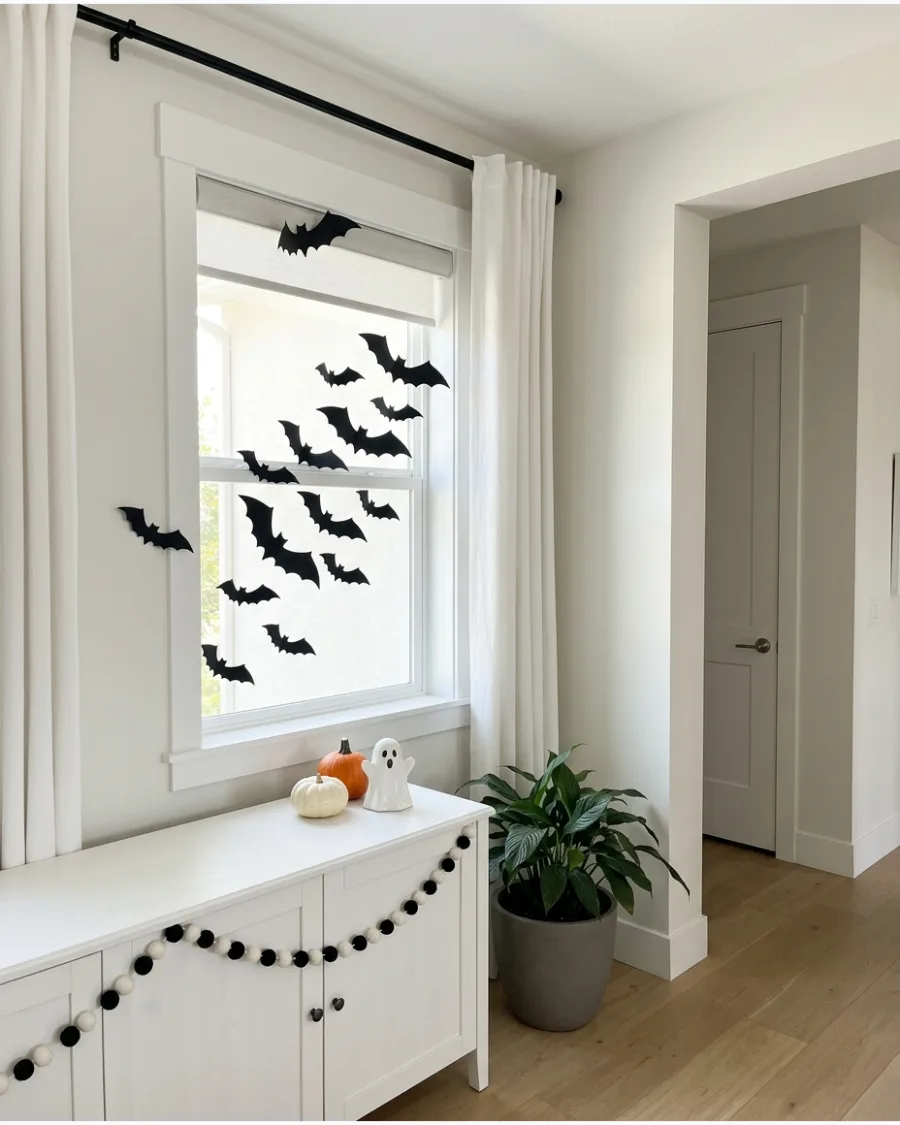 22. Bats Flying Through a Window