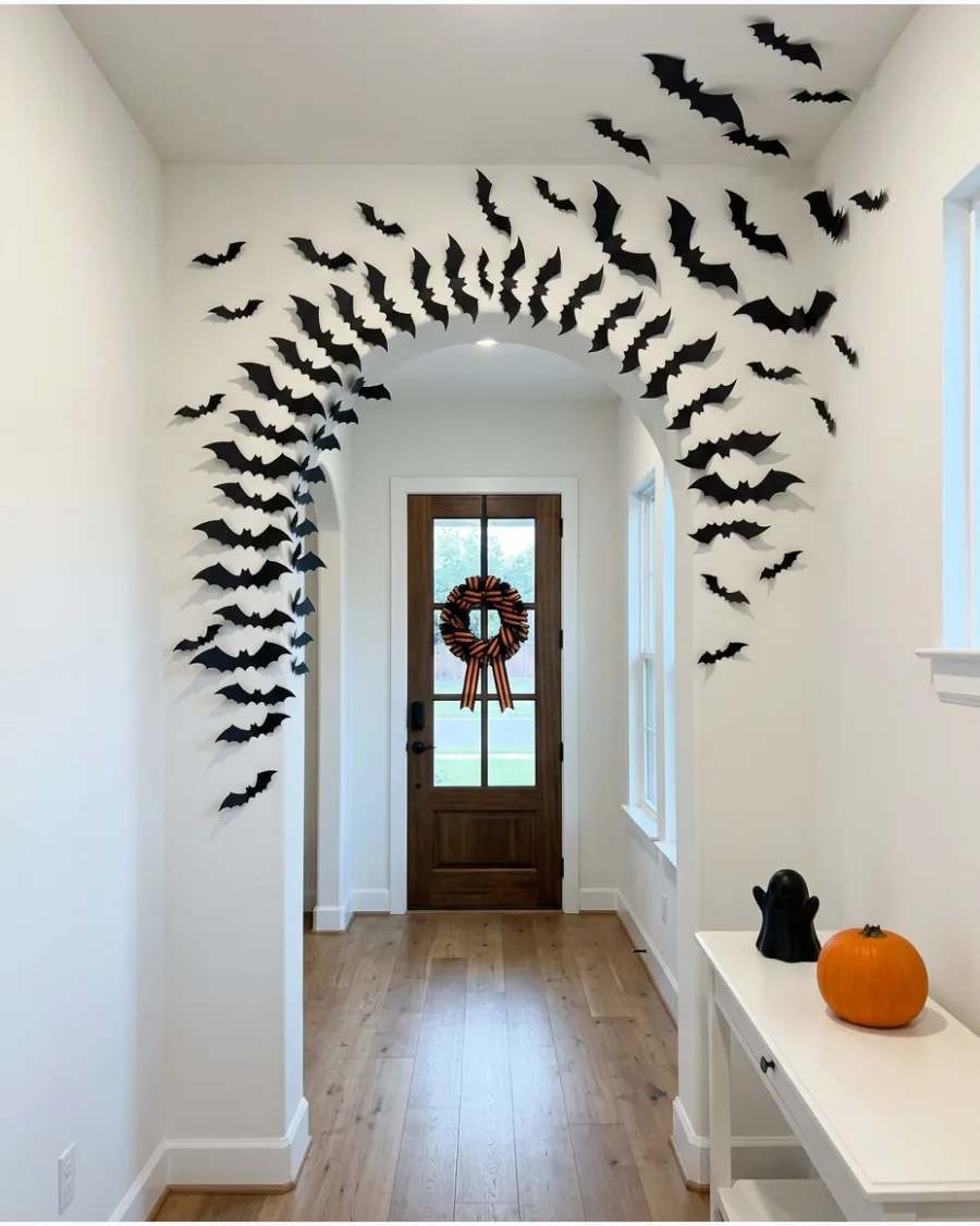 25. Bats Around an Arched Doorway