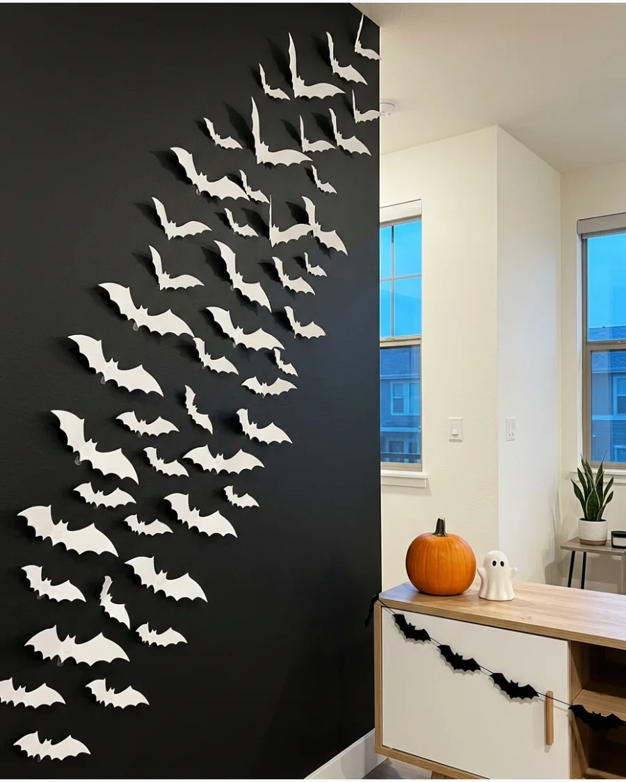 47. White Bats on a Black Wall