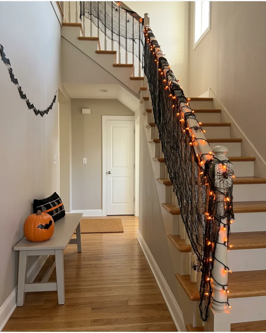 37. Black-and-Orange Staircase Lights