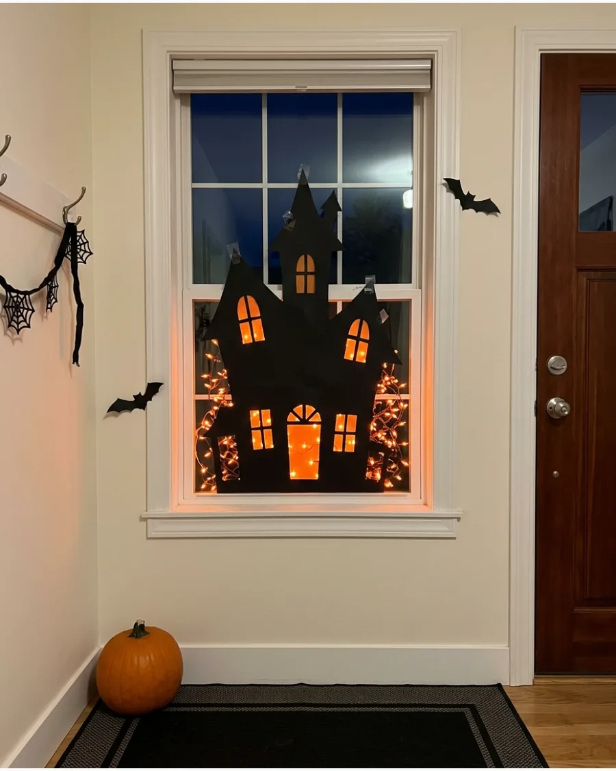40. Glowing Haunted-House Window