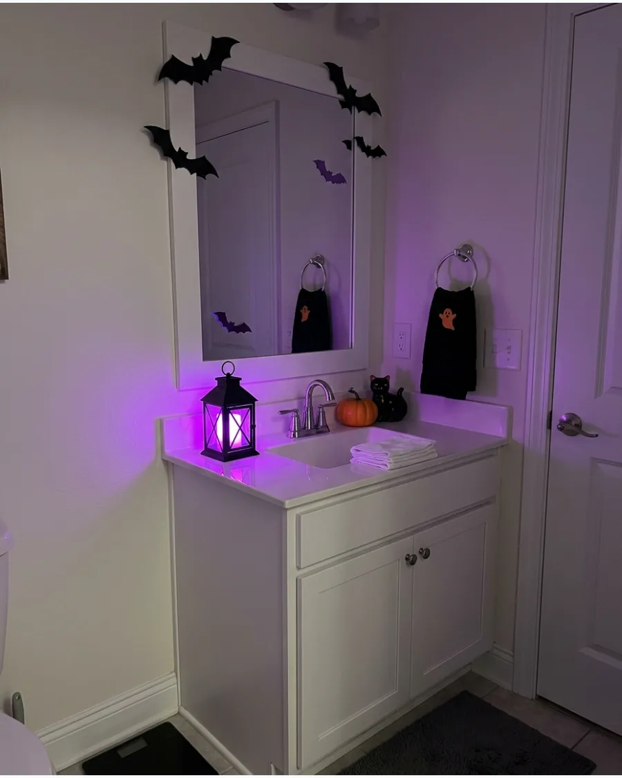 57. Purple Bathroom Night-Light Display