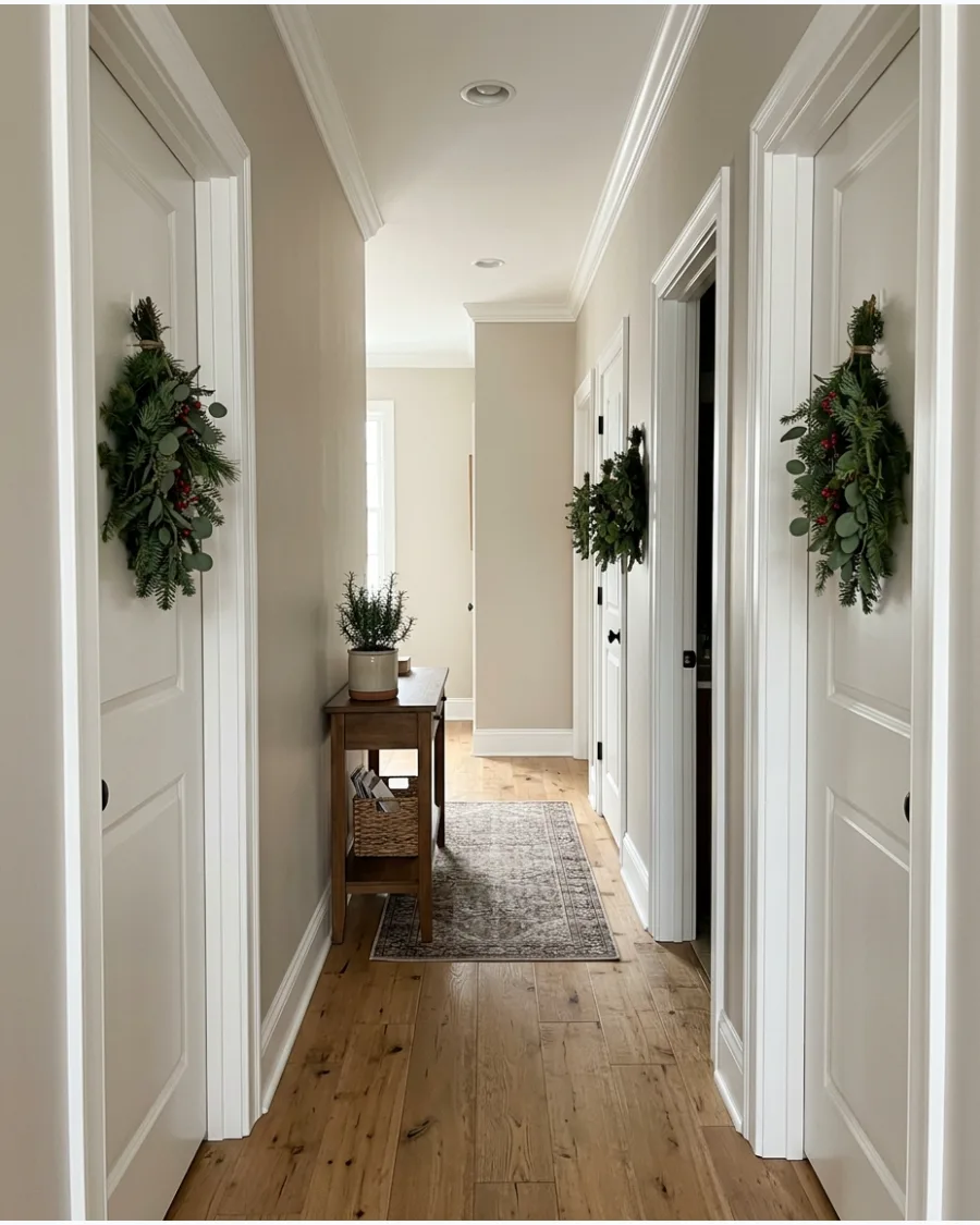 10. Minimal Greenery Swags Between Doorways