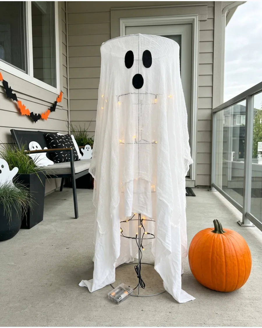 11. Twinkling Tomato Cage Ghost