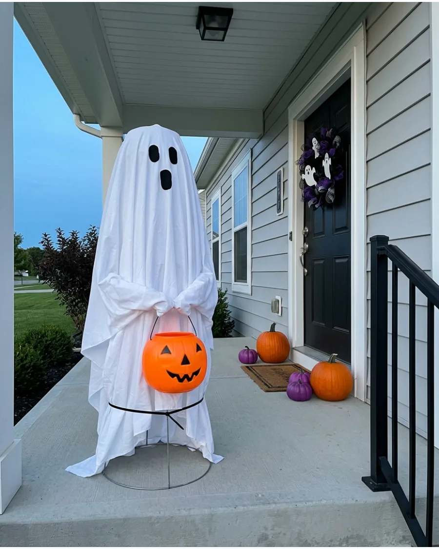 21. Ghost Holding a Pumpkin