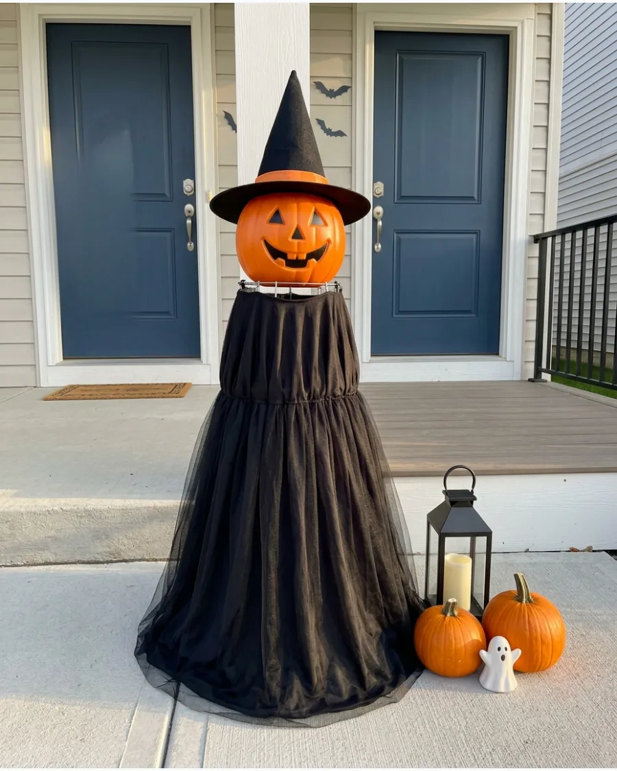 26. Smiling Pumpkin-Head Witch
