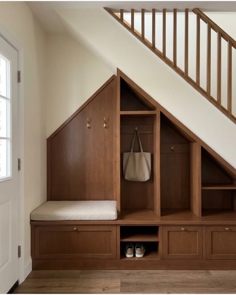 25. Warm Brown Under-Stairs Mudroom