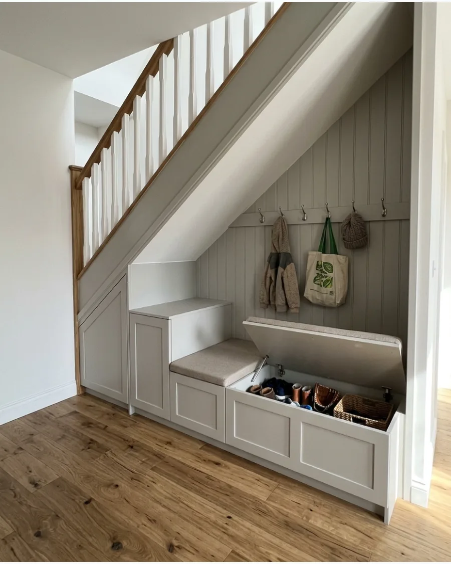 8. Under-Stairs Mudroom With Hidden Storage Bench