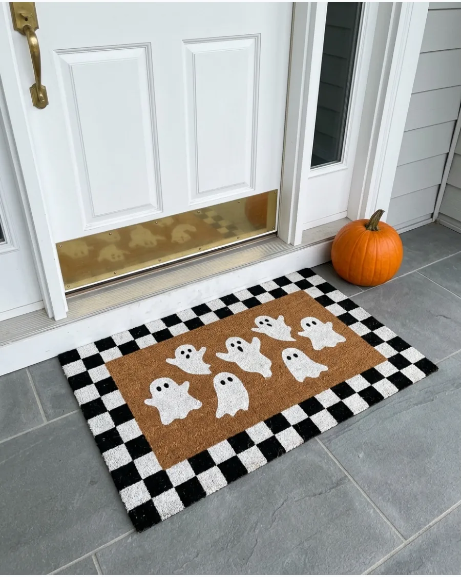 25. Checkered Ghost Doormat