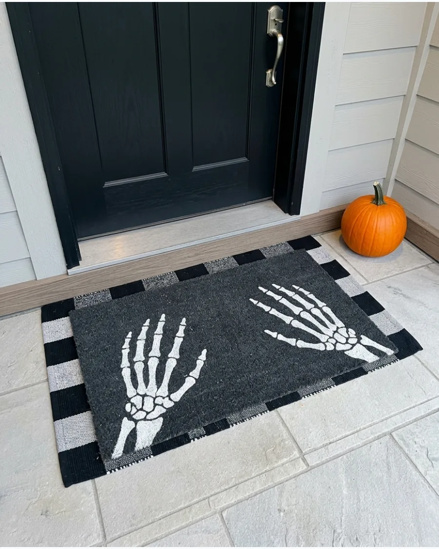 36. Skeleton Hands Doormat
