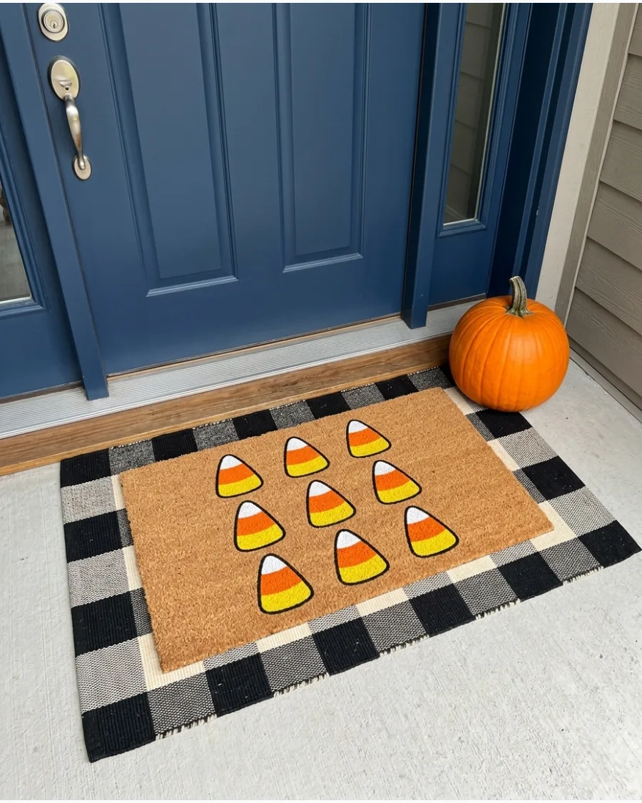 8. Candy Corn Halloween Doormat