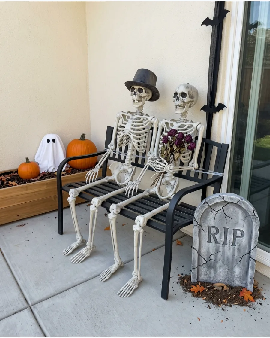 31. Skeleton Couple on a Bench