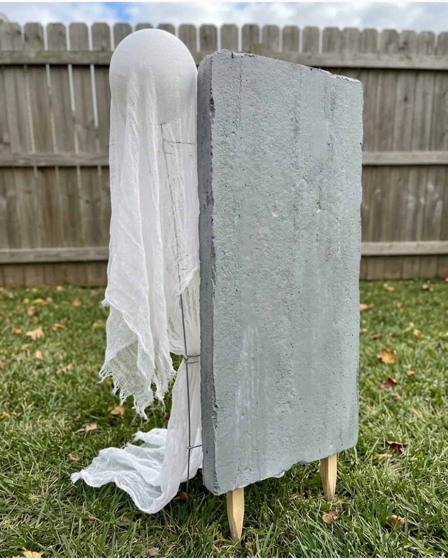 54. Ghost Behind a Tombstone