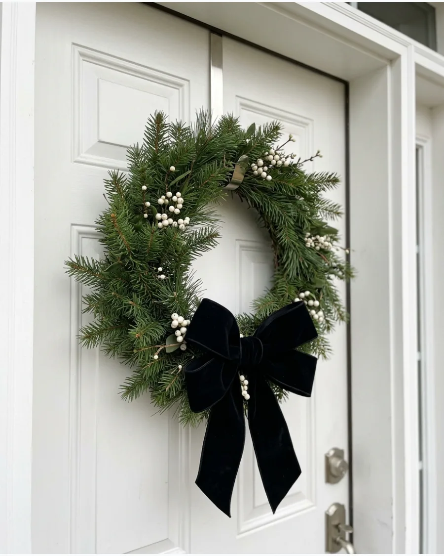 27. Black Velvet Bow Christmas Wreath