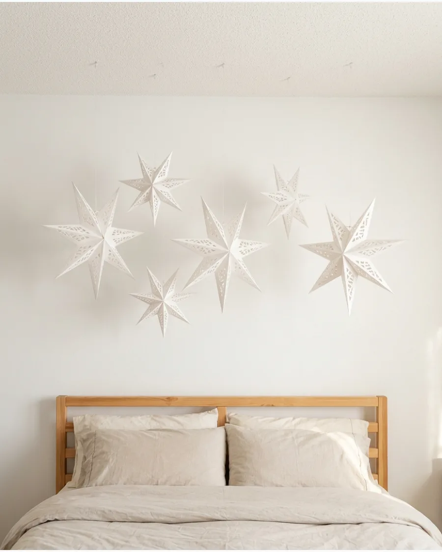 16. Hanging Paper Stars Above the Bed