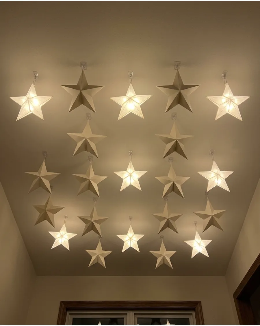 27. Illuminated Christmas Star Ceiling
