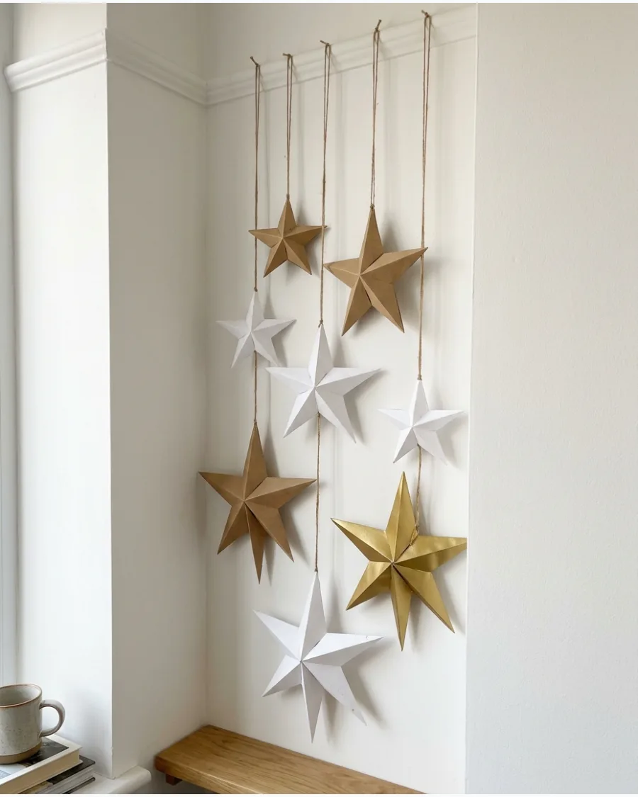 55. Hanging Paper Star Christmas Wall