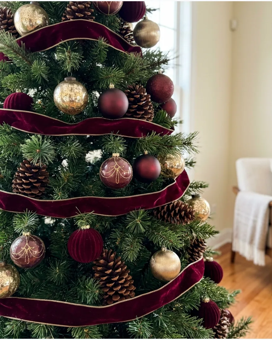 45. Burgundy and Gold Christmas Tree With Pinecones