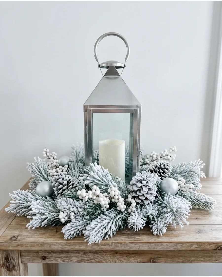 19. Silver Lantern With Snowy Greenery