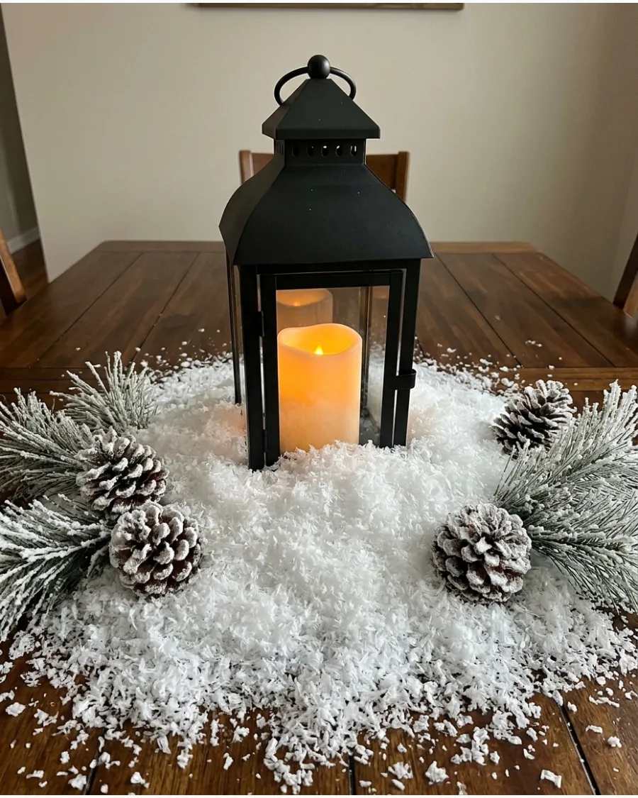 31. Snowy Lantern Christmas Centerpiece