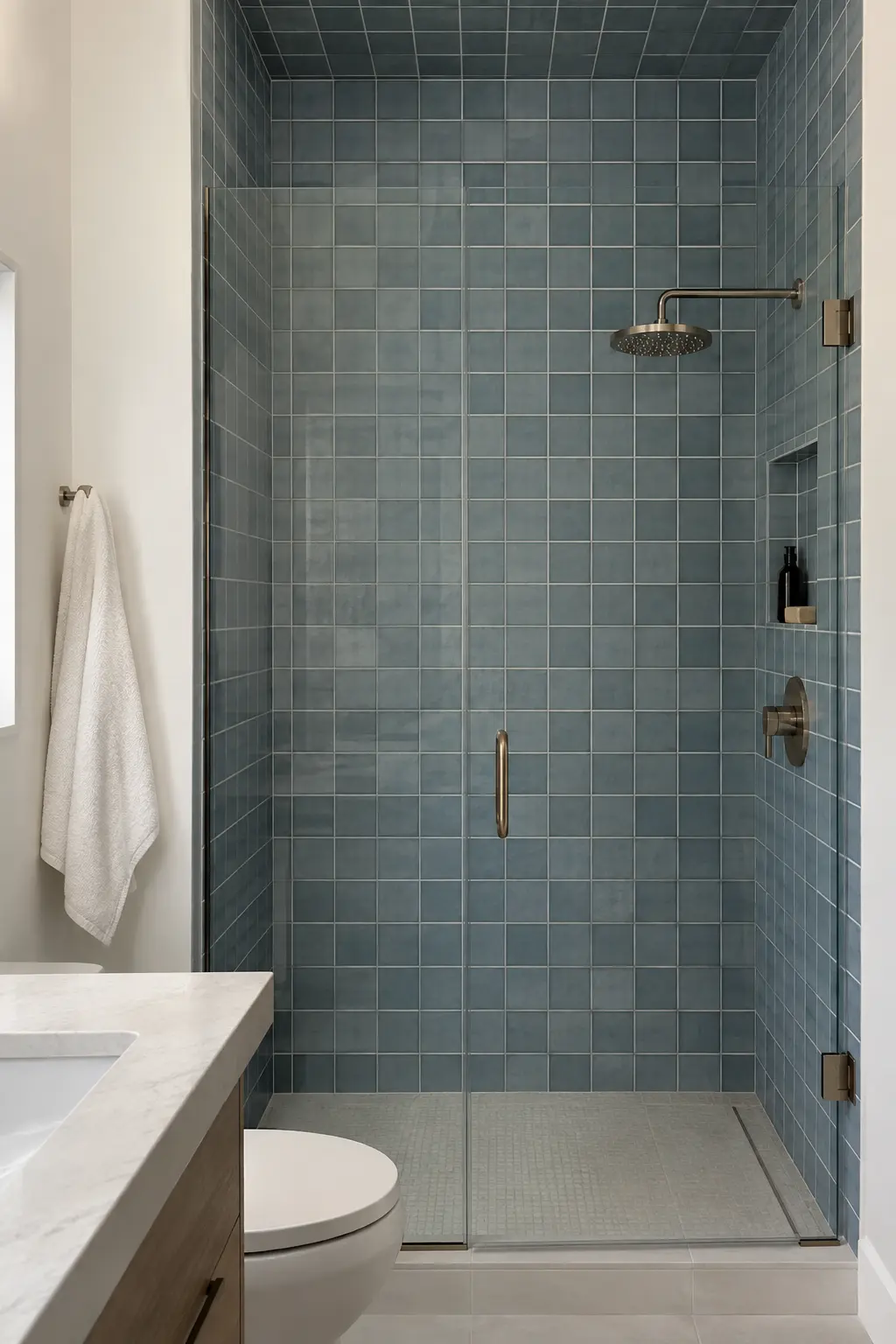 Standard-height shower with simple tile carried fully to the ceiling