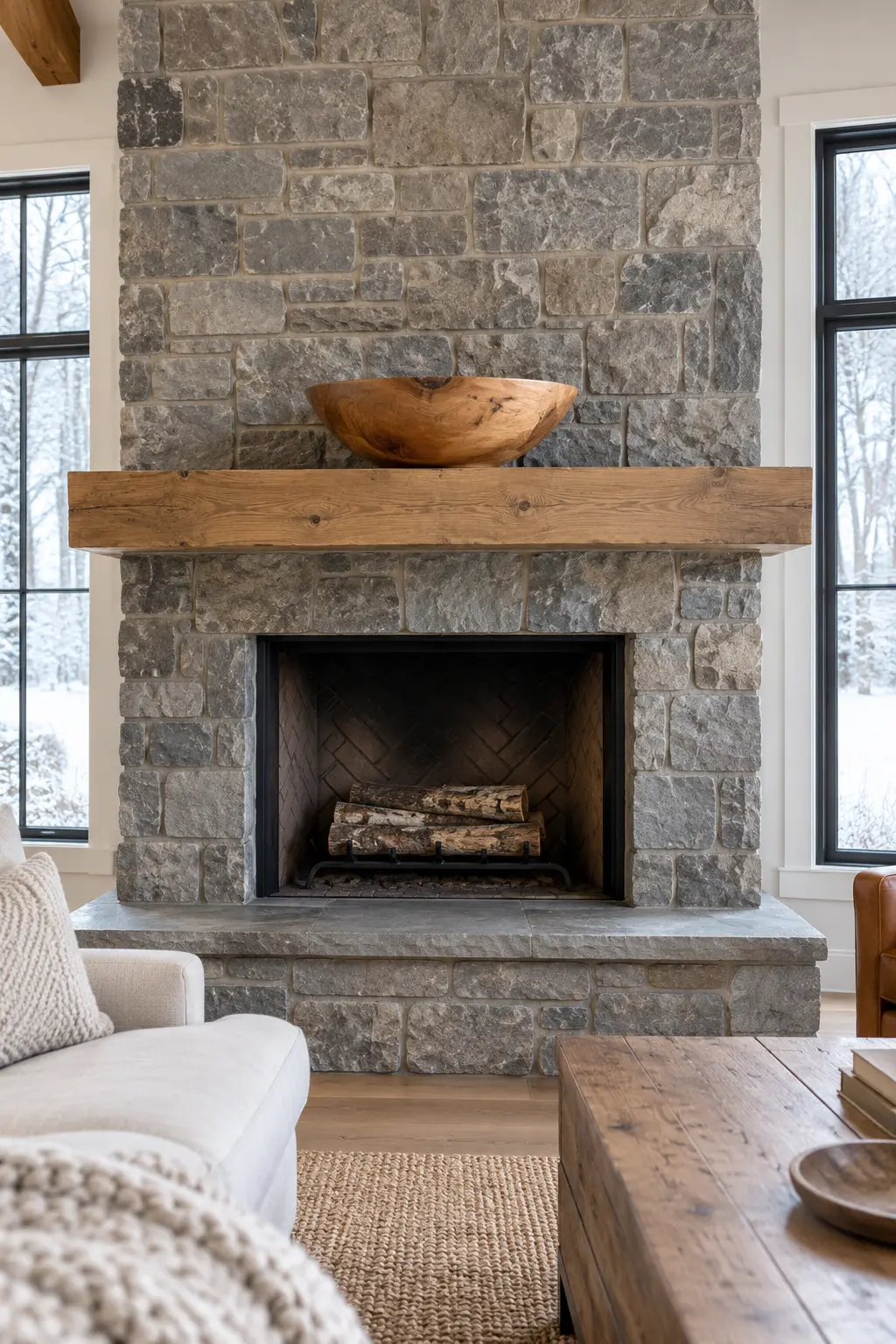 Warm a Stone Fireplace With Wood winter mantel decorating idea